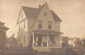 Grand Rapids Michigan view of familh on house porch real photo pc ZC549053