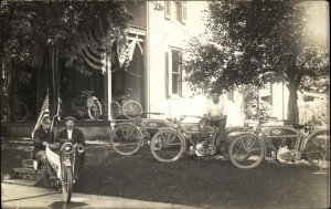 Excelsior Motorcycles Bicycles on Porch American Flags c1910 RPPC Postcard