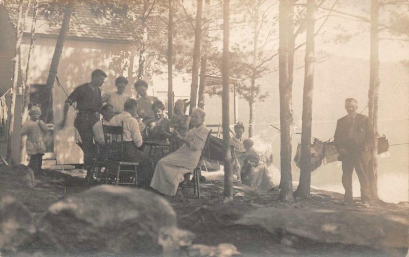 RPPC PLAYING CARDS PICNIC LAKE CABIN PARTY REAL PHOTO POSTCARD (c. 1910)