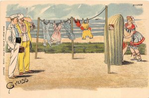 COMIC GRUSS AUS LIGHTHOUSE WOMAN CHANGING CLOTHES ON BEACH GERMANY POSTCARD