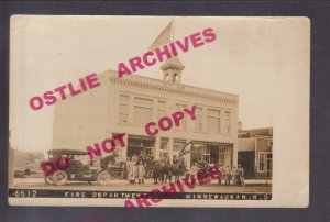 Minnewaukan NORTH DAKOTA RPPC 1911 FIRE DEPARTMENT Firemen Posing nr Devils Lake