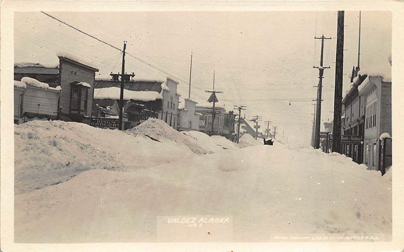 Valdez AK Snowy Street View Store Fronts, in 1916  RPPC Postcard