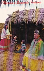 Indians Grinding Corn Meal Seminole Okalee Indian Village In Florida