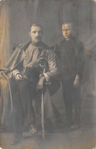 WWI Austo-Hugarian officer Soldier c1915 RPPC Real Photo Postcard Sword Hat Son