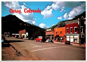 Main Street Ouray Colorado Postcard Jeep Cars Cascade Grocery Liquor