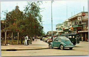 Postcard Honduras Cortes San Pedro Sula Barahona Park Coke cars vw  pepsi texaco