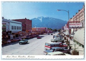 c1960s Realty Insurance Sewing Machines Main Street Hamilton Montana MT Postcard