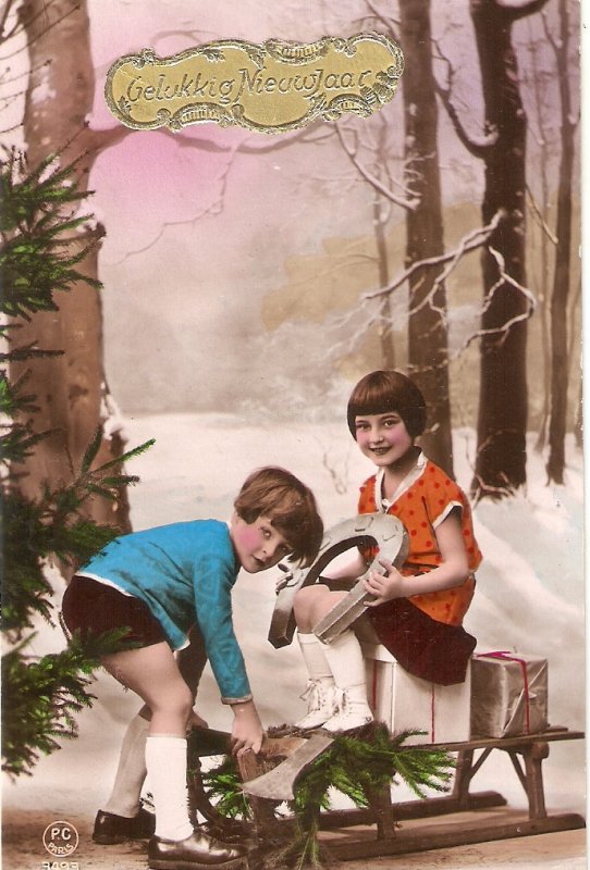 Boy and girl with  horseshoe and gifts Old vintage French postcard