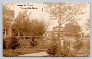 J90/ Ainsworth Nebraska RPPC Postcard c1910 Secons Street Homes 658