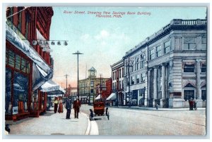 1909 River Street Showing New Savings Bank Building Manistee Michigan Postcard