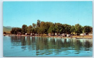 McCALLISTER, MT Montana ~ LAKE SHORE LODGE Trailer Camp c1960s  Postcard