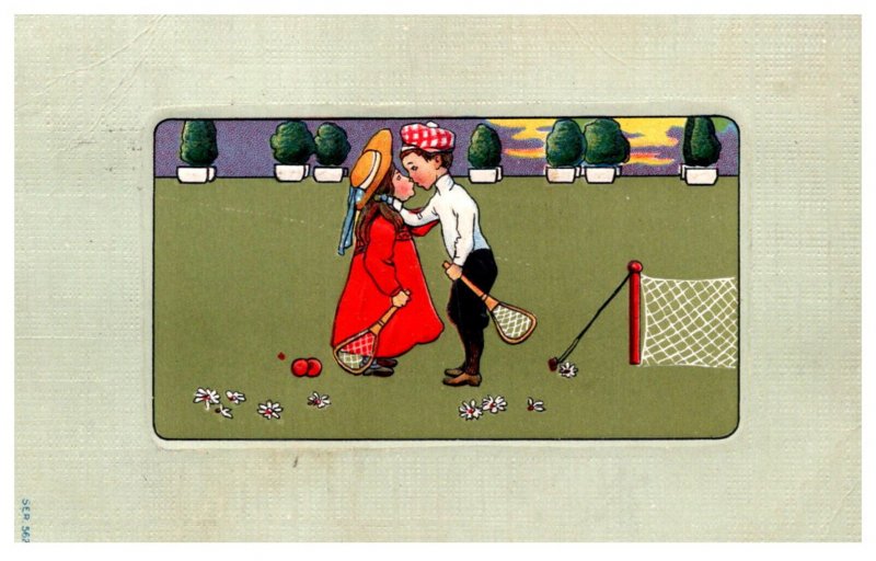 Couple kissing , Badminton