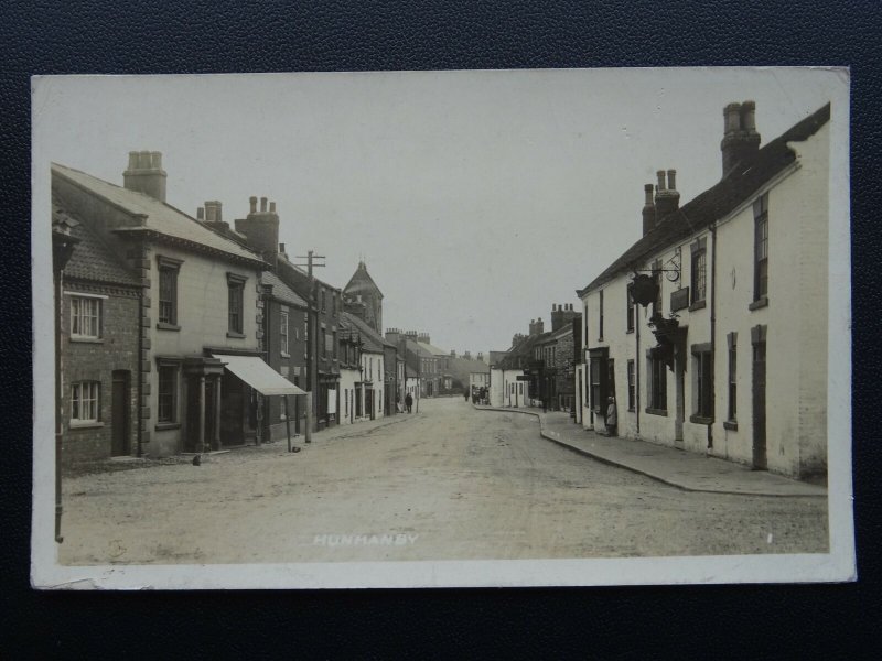 HUNMANBY Bridlington Street shows SOUTHGATE INN c1920 RP Postcard by W. Bramley