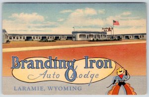 1940's BRANDING IRON AUTO LODGE LARAMIE WYOMING WY COWBOY LASSO MOTEL POSTCARD