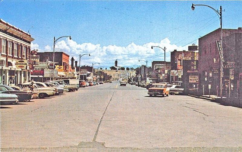 Greybull WY Yellowstone Park Store Fronts Old Cars Postcard 