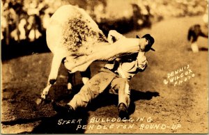 RPPC Cowboy Steer Bulldogging Pendleton Roundup Wilcox Real Photo Postcard