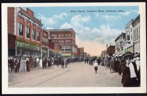 42220) Oklahoma SHAWNEE Main Street looking West group people store fronts - WB
