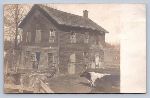 J98/ Oklahoma? RPPC Postcard c1910 Old Court House Now Barn Cows Farmer 244