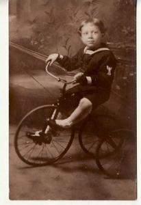 RPPC -- YOUNG BOY in Navy Uniform on TRICYCLE, postcard