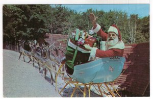 North Pole, N.Y., Santa Greets you from his sleigh at Santa's Workshop