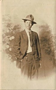 LOS ANGELES~WORLD WONDERS STUDIO~YOUNG MAN IN SUIT-WW1 HAT-REAL PHOTO POSTCARD