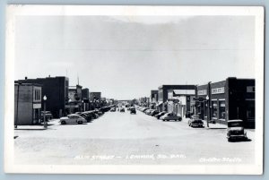 Lemmon South Dakota SD Postcard RPPC Photo Main Street Cars Ford Chevrolet c1950