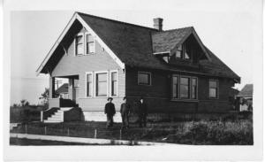 Postcard  3 Men by Old House. Location Unknown.  RPPC  (btwn 1904-18)