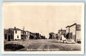 North Bridgewater South Dakota SD Postcard RPPC Photo Main Street Dirt Road Cars