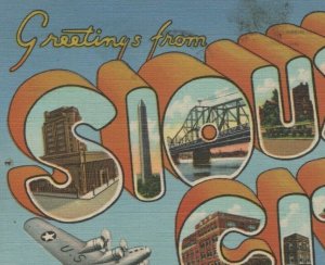 Greetings from Sioux City Iowa large letters airplanes c1940s linen D52 