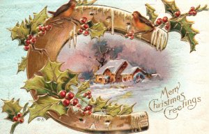 1911 Merry Christmas Greetings Horse Shoe Holly Snow House Vintage Postcard