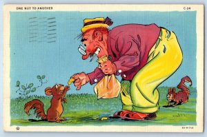 1941 Man Feeding Squirrel One Nut To Another Newark Ohio OH Vintage Postcard