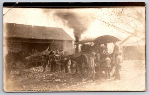 Farm~Steam Tractor Blows Smoke in Barn Yard~Farmers Gather Round~1910 RPPC