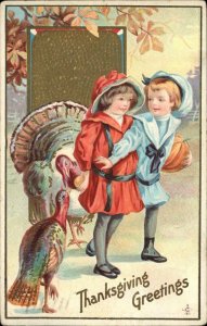 THANKSGIVING Girl and Boy w Turkeys EMBOSSED c1910 Postcard