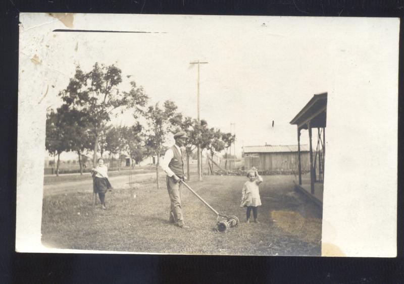 RPPC DOWNS KANSAS RESIDENCE LAWNMOWER LAWN MOWING REAL PHOTO POSTCARD