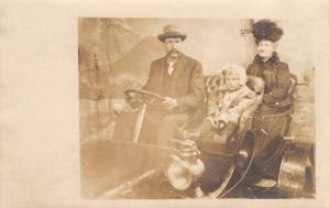 Real Photo Postcard~Father & Baby Daughter in Automobile~Grandma~Spokane~c1912 