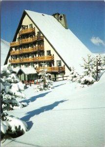 Postcard France Les Deux Alpes - Hotel Adret exterior view in winter