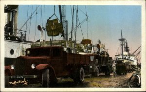 Haiphong Vietnam Old Trucks Being Loaded on Dock Tinted Real Photo Postcard