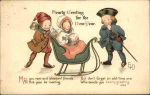 New Year Children Ice Skating & Sled Ethel DeWees c1910 Nister Postcard