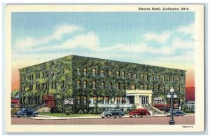 c1940 Exterior View Stearns Hotel Classic Cars Park Ludington Michigan Postcard