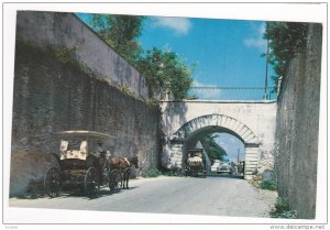 Gregory Arch leads from Nassau over the hill to Grant's Town, the colourful...