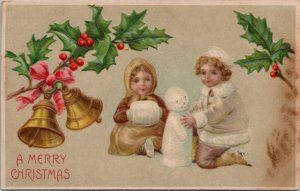 Christmas Greetings Children Baby Snowman Bells Pink Ribbon 1907 Postcard Z1