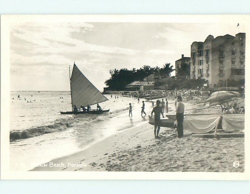 Pre-1950 rppc SAILBOAT & HOTEL AT BEACH Honolulu Hawaii HI v5052