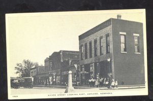 ASHLAND NEBRASKA DOWNTOWN STREET SCENE VINTAGE POSTCARD OLD CARS STORES