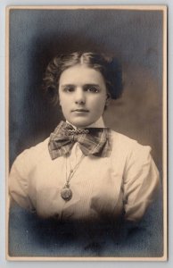 RPPC Lovely Young Woman Portrait Plaid Bow Tie with Clip Locket  Postcard E29