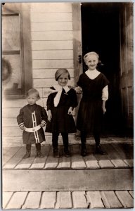 Three Little Kids Photographed Outside The House Real Photo RPPC Postcard