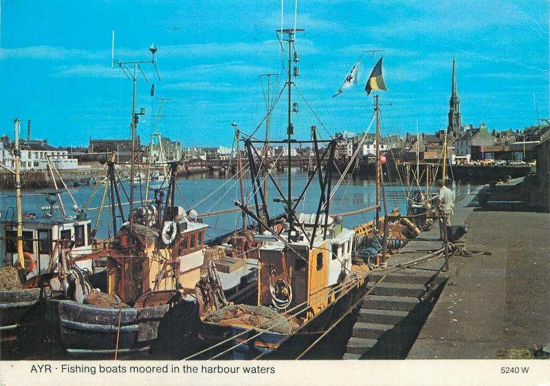 Fishing boats moored in the harbour waters Ayr