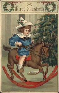 Christmas BW Series 7 Little Boy on Rocking Horse c1910 Embossed Postcard