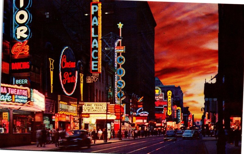 VINTAGE POSTCARD ST. CATHERINE STREET SCENE AT NIGHT MONTREAL CANADA LATE 1940s