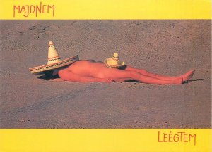 Risque Postcard sunbathing man funny pinup sombrero hat