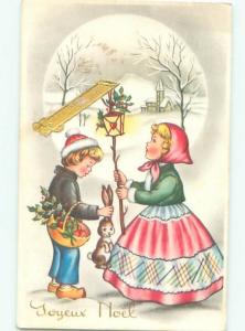 foreign Old Postcard BOY HOLDS EASTER BUNNY BY EARS AT CHRISTMAS TIME AC2400